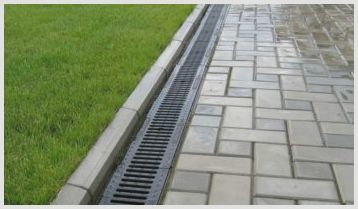 Основные разновидности водостоков для отвода воды с тротуарной плитки, их классификация