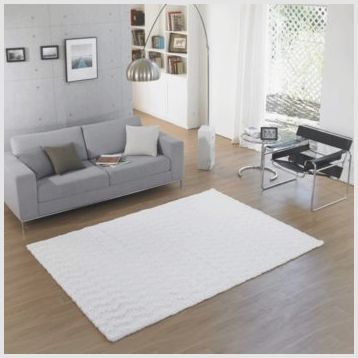 Рекомендации по использованию однотонных ковров для оформления жилых комнат