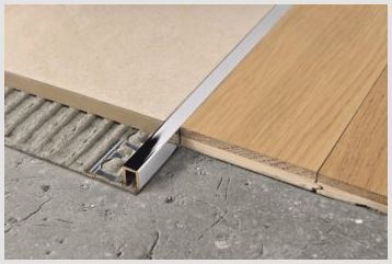 Как своими руками сделать стык между плиткой и панелью ламината?
